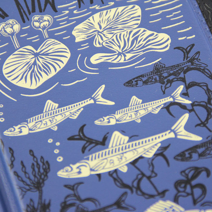 A gift set "Shchuchy" with the book "The Big Book of Russian fishing" and pike figurines